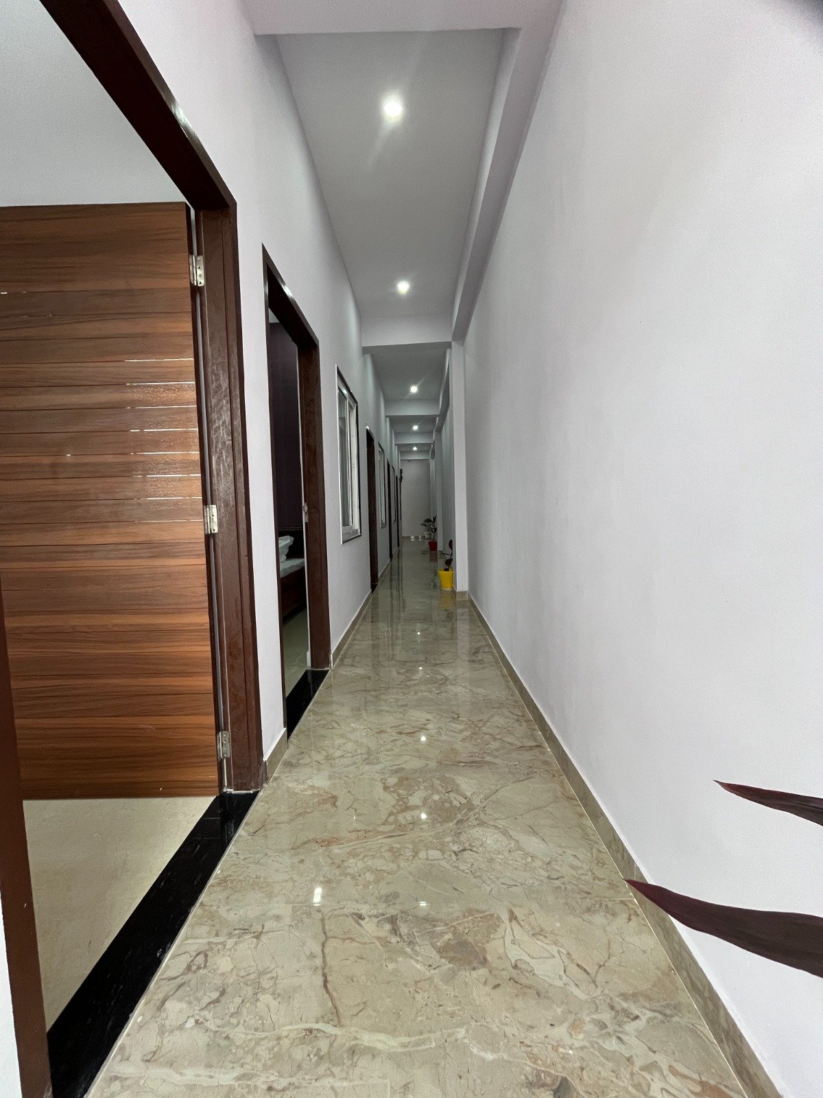 Corridor view. The Cosmos - PG & Hostel For Girls.
